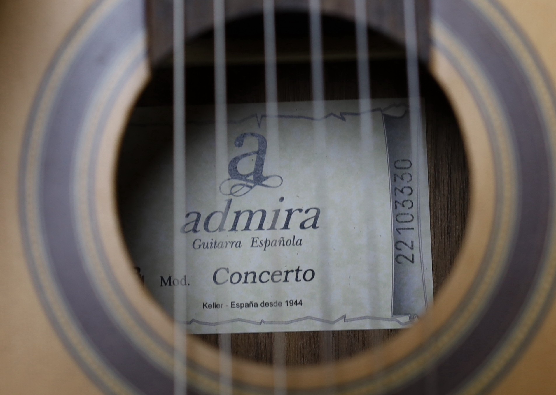 An Admira 'Concerto' classical guitar. Cedar top, satin finish with rosewood back and sides